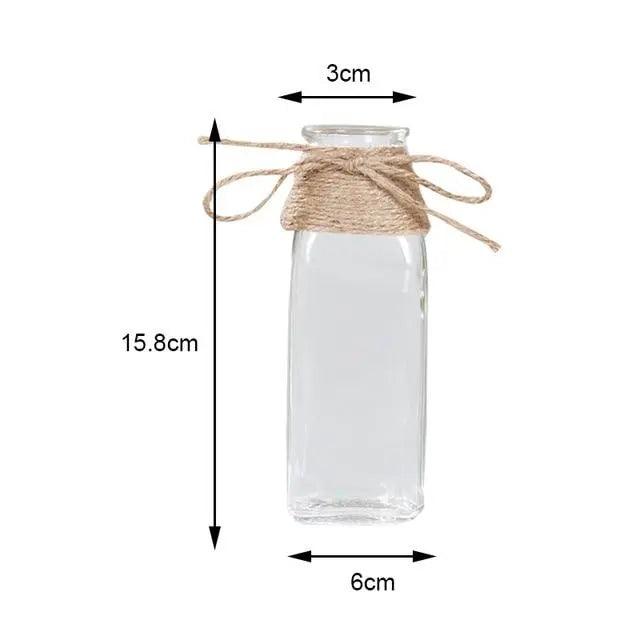 Minimalistyczny szklany wazon - elegancka dekoracja stołu